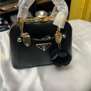 Prada Black Satchel with Gold Details